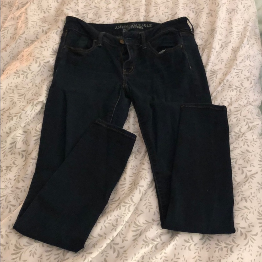 Dark wash mid rise skinny jeans